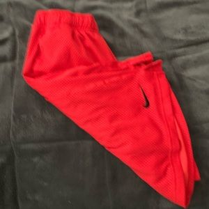 Red Nike shorts